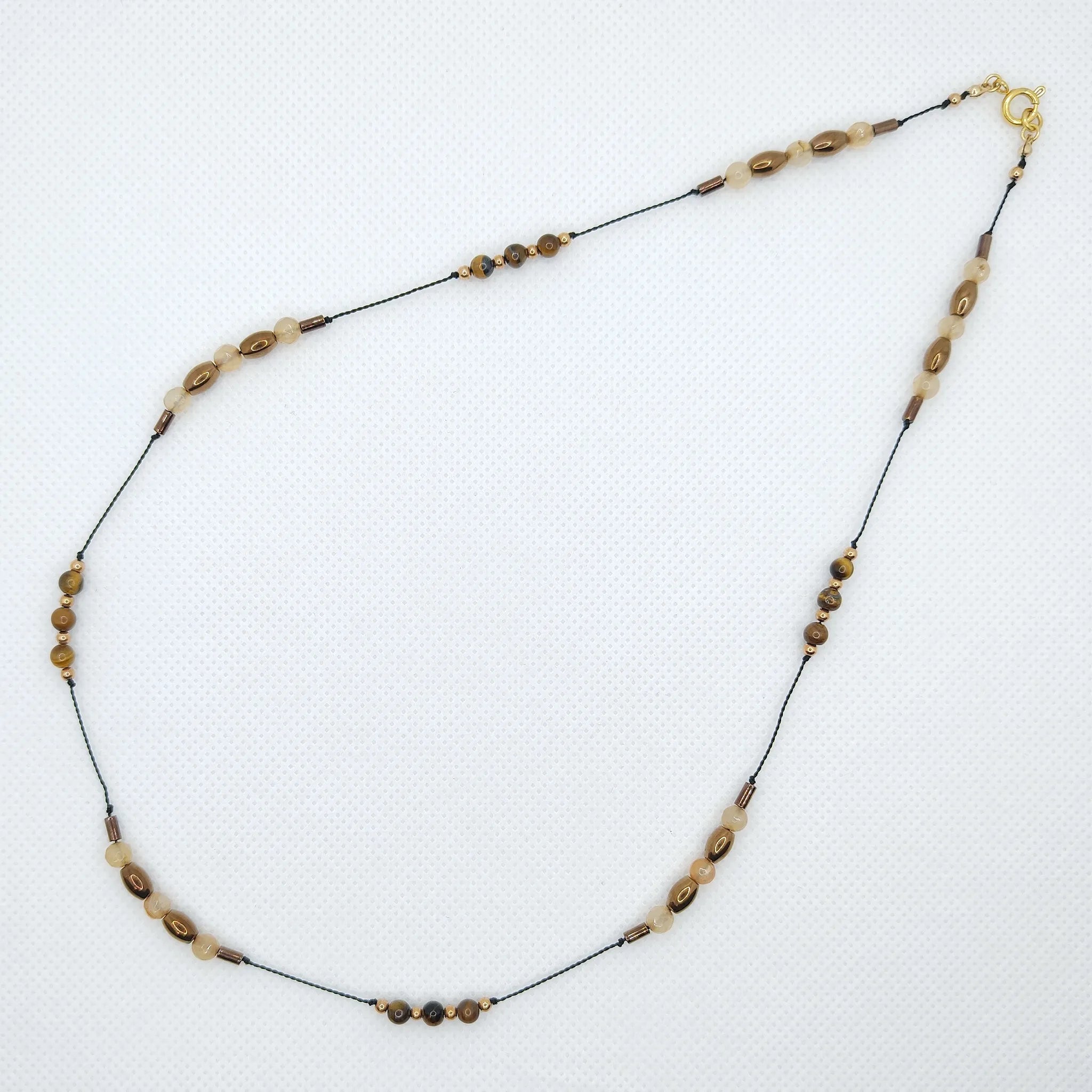 Naszyjnik na nici nylonowej z tygrysim okiem i agatem ognistym